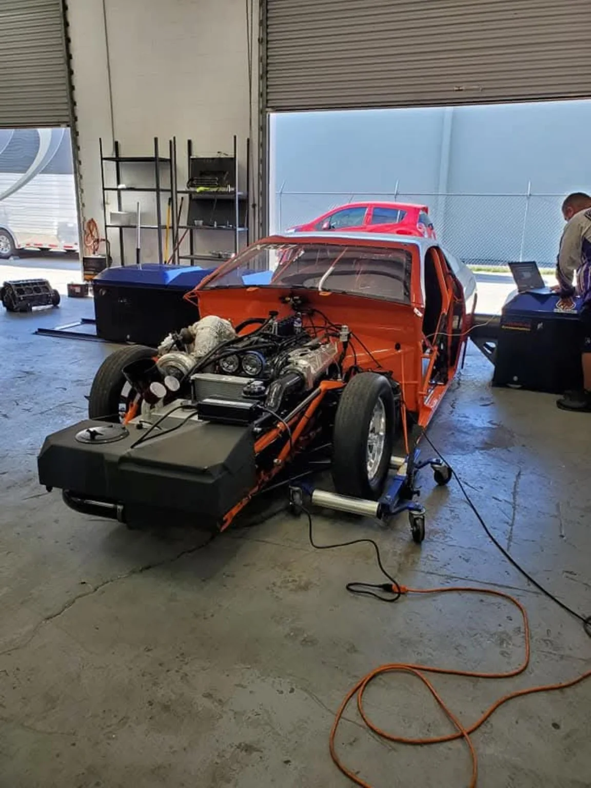 Tube-chassis 2JZ import race car on a hub dynamometer